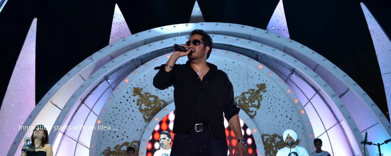 Elegant wedding setup with floral decorations and seating, white chairs and pastel flowers on tables, soft natural lighting, close up of floral centerpiece